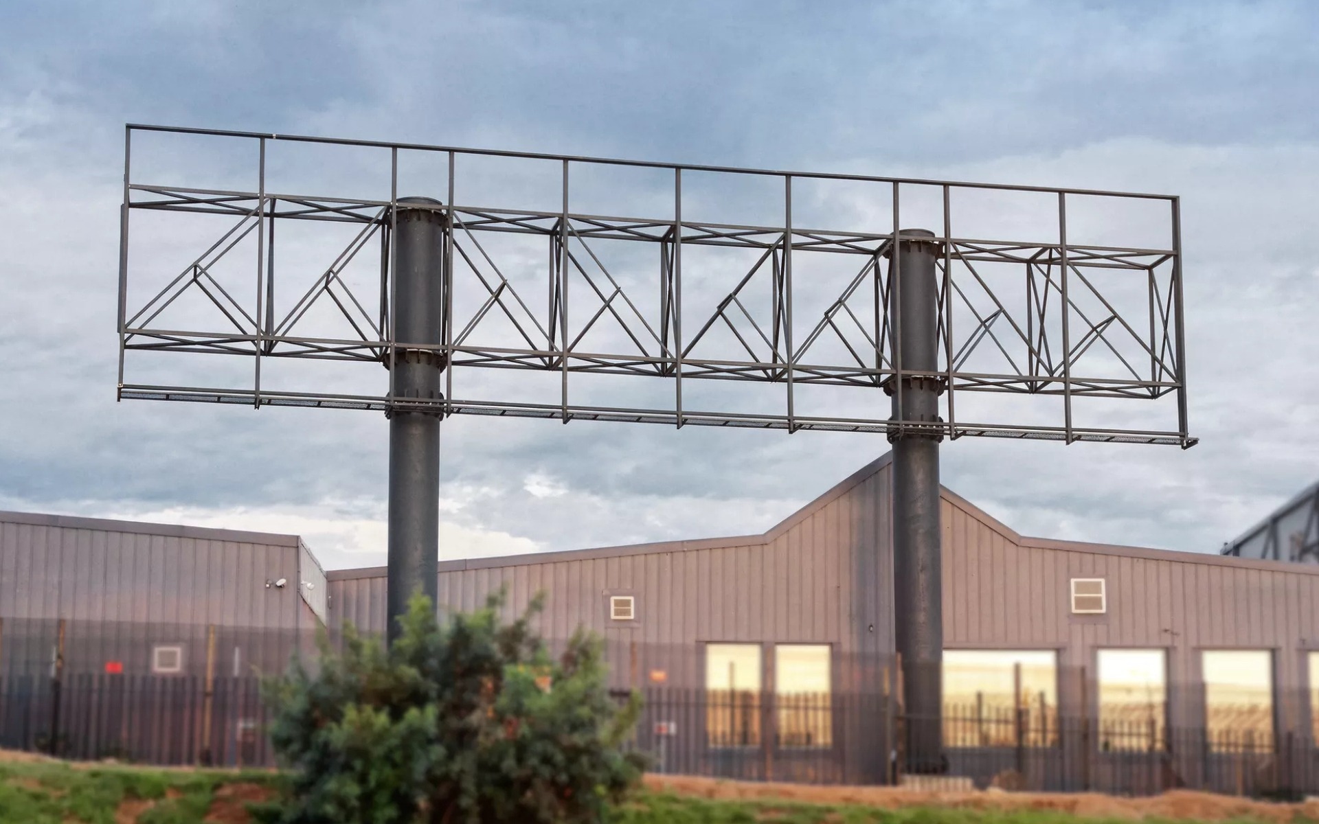 Twin-column steel billboard structure for outdoor advertising