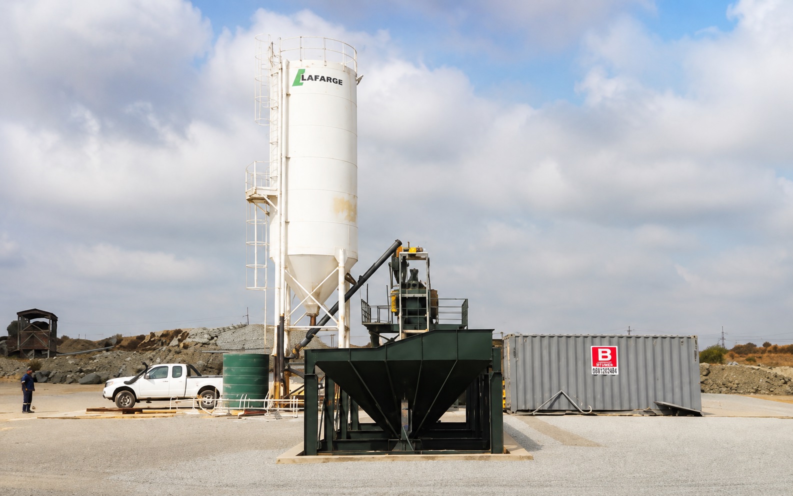 Completed PJR Engineering plant installation with a silo, feed hopper and supporting industrial equipment.